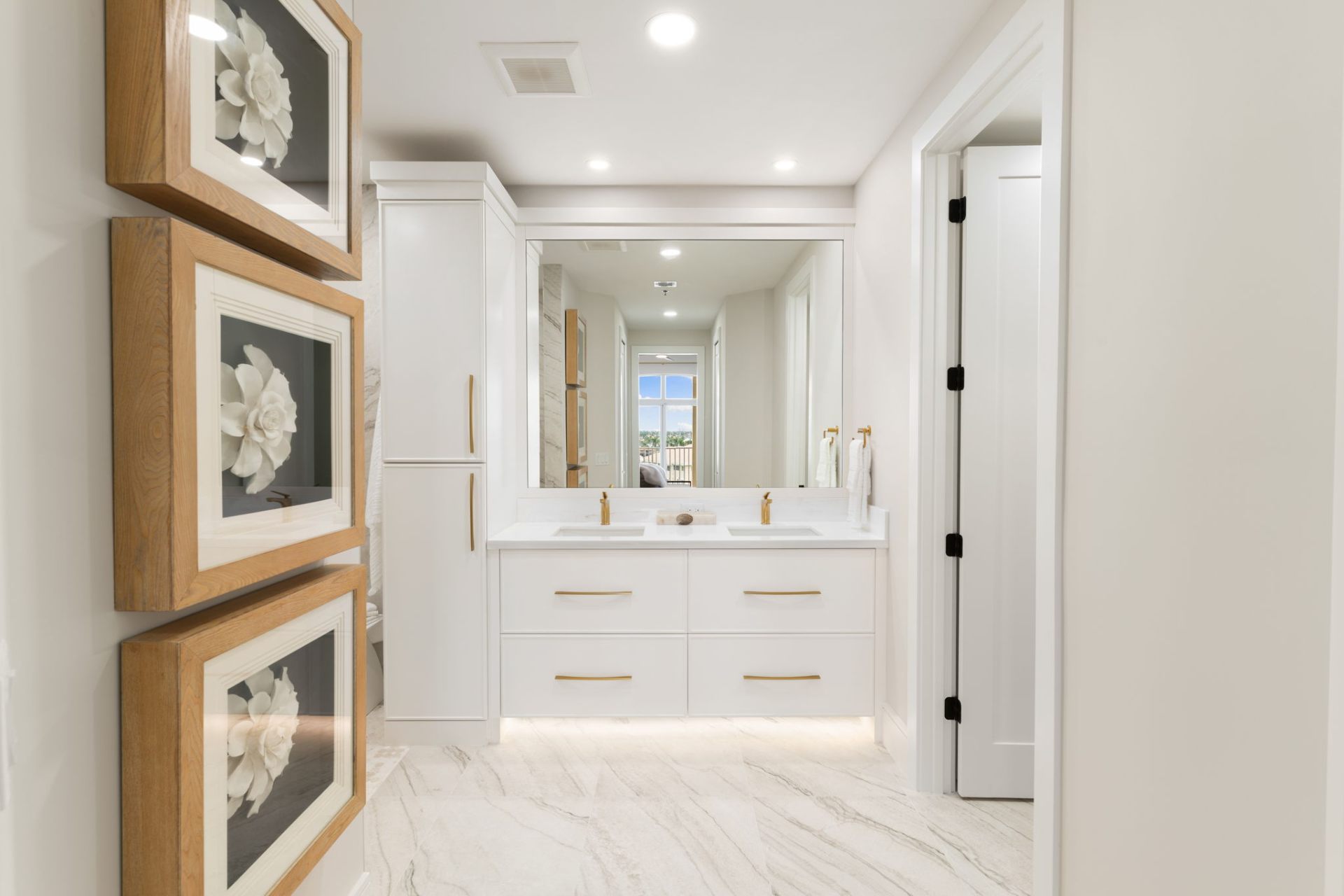 Marble Primary Bath — custom cabinetry project by Livingstyles Interiors in Marco Island, 2024