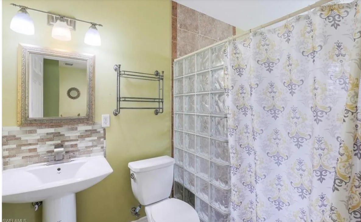 Guest Bath before the renovation at 10th Avenue Estate in Naples, Florida