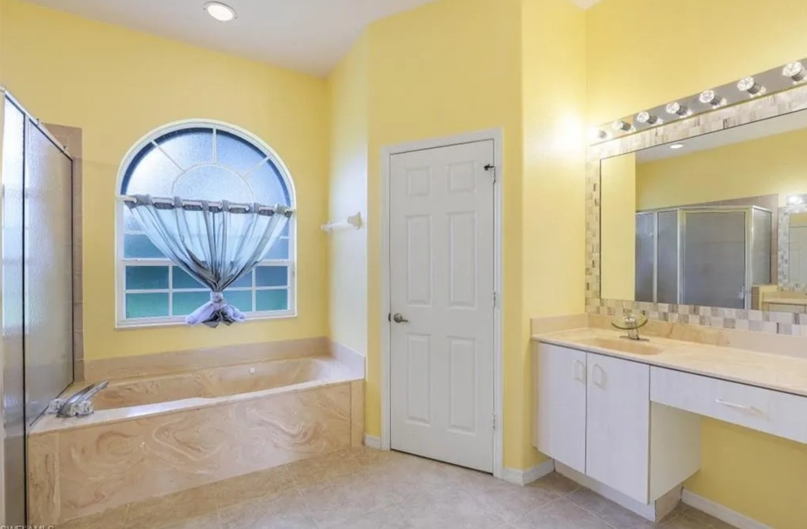 Primary Bath before the renovation at 10th Avenue Estate in Naples, Florida